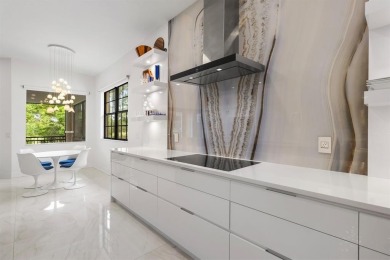 Live the ultimate country club lifestyle in this exquisitely