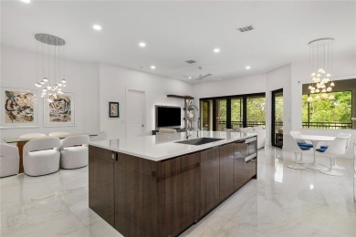 Live the ultimate country club lifestyle in this exquisitely