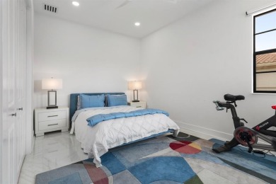 Live the ultimate country club lifestyle in this exquisitely