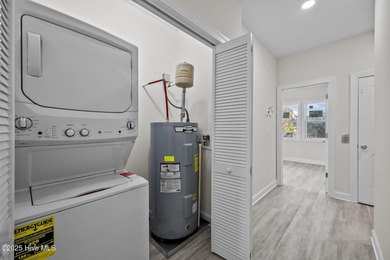 $10,000 USE AS YOU CHOOSE - MOVE-IN READY BEACH RETREAT! For