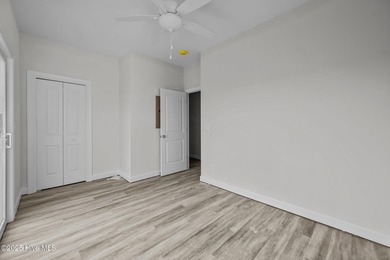 $10,000 USE AS YOU CHOOSE - MOVE-IN READY BEACH RETREAT! For