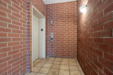 BEAUTIFULLY MAINTAINED LUXURIOUS FIRST FLOOR CONDO, ATTACHED