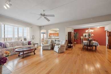 BEAUTIFULLY MAINTAINED LUXURIOUS FIRST FLOOR CONDO, ATTACHED