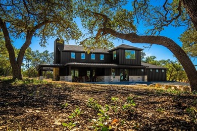 Picturesque Hill Country retreat nestled in the quite gated