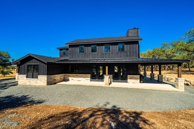 Picturesque Hill Country retreat nestled in the quite gated