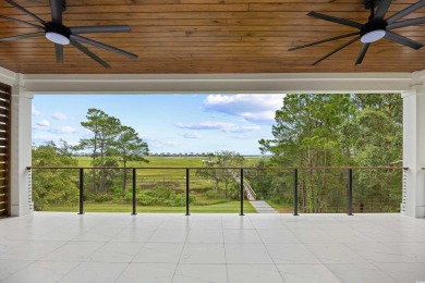 Experience coastal living at its finest in this exceptional and