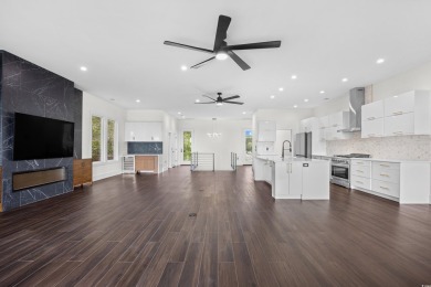 Experience coastal living at its finest in this exceptional and