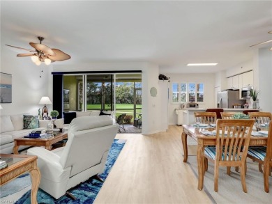 FULL GOLF MEMBERSHIP INCLUDED with this pristine 2/2 1st floor