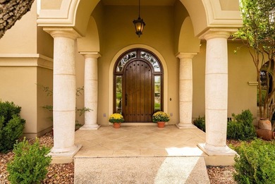 Elegantly situated on the 18th hole of Comanche Trace's