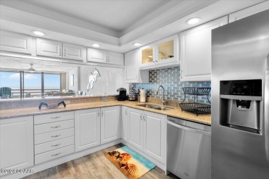 Experience luxury oceanfront living in this fully renovated