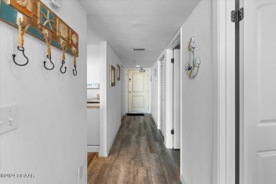 Experience luxury oceanfront living in this fully renovated