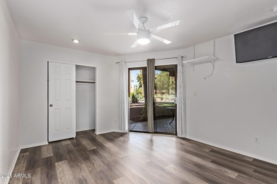 This highly desired ground level home provides great views and