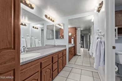 This highly desired ground level home provides great views and