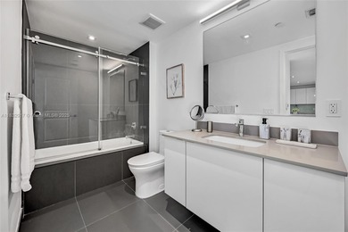 Spacious high-floor corner 2BD/2BA unit in the heart of the Arts