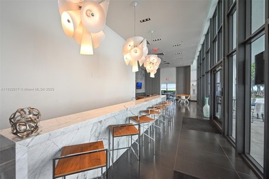 Spacious high-floor corner 2BD/2BA unit in the heart of the Arts