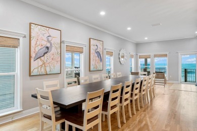 HIGHLIGHTS:  Beachfront beauty  Gorgeous Gulf views  3 levels