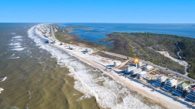 HIGHLIGHTS:  Beachfront beauty  Gorgeous Gulf views  3 levels