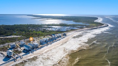 HIGHLIGHTS:  Beachfront beauty  Gorgeous Gulf views  3 levels