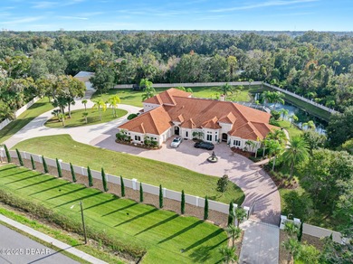 Welcome to 602 Tomoka Avenue - a gated, custom-built estate