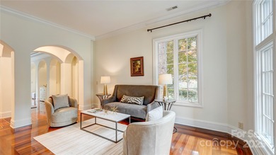 Enjoy luxurious gated living in this stately home in Courance