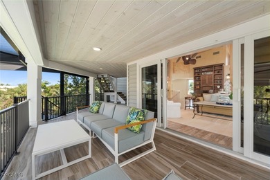 Discover a breathtaking waterfront estate where architectural