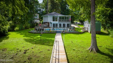 Here is your 2nd chance! This rare, riverfront retreat in River