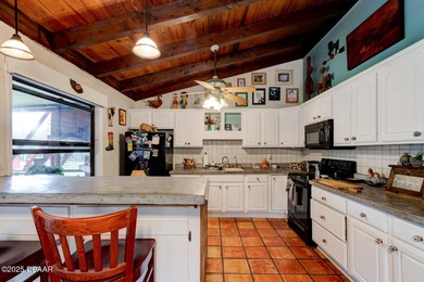 Welcome to your private 4.99-acre estate, perfectly situated