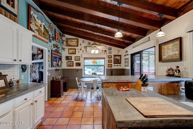 Welcome to your private 4.99-acre estate, perfectly situated