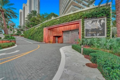 This extraordinary corner unit with unobstructed views,  Armani