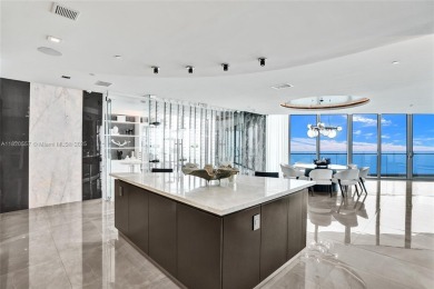 This extraordinary corner unit with unobstructed views,  Armani