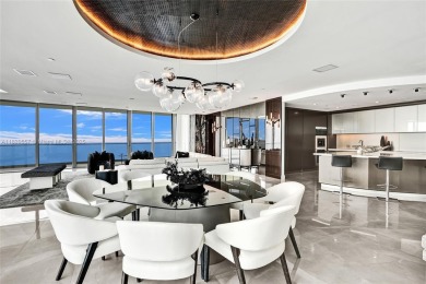 This extraordinary corner unit with unobstructed views,  Armani