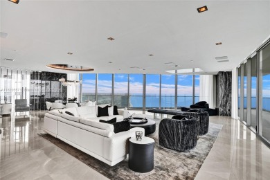 This extraordinary corner unit with unobstructed views,  Armani