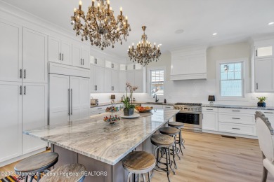 This exquisite newly constructed home features top of the line