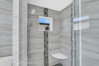 This exquisite newly constructed home features top of the line