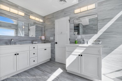 This exquisite newly constructed home features top of the line