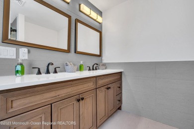 This exquisite newly constructed home features top of the line