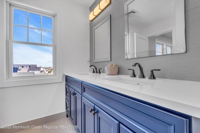 This exquisite newly constructed home features top of the line