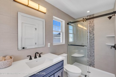 This exquisite newly constructed home features top of the line