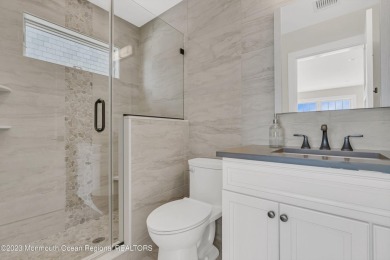 This exquisite newly constructed home features top of the line