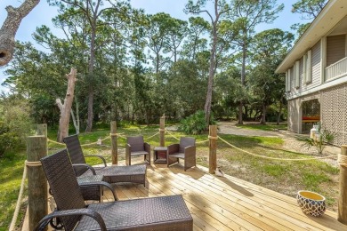 PRICE REDUCED!  Custom Built, BAY FRONT home with private dock