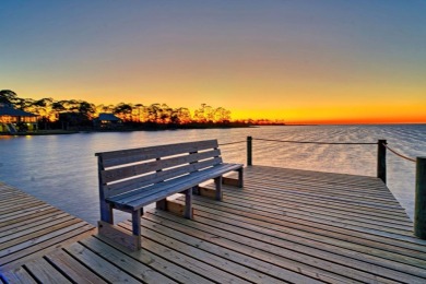 PRICE REDUCED!  Custom Built, BAY FRONT home with private dock