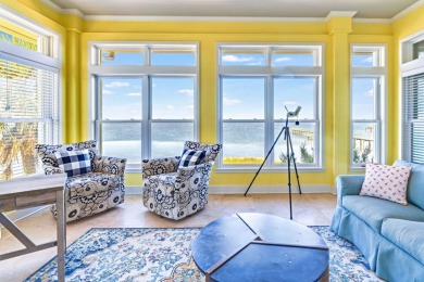 PRICE REDUCED!  Custom Built, BAY FRONT home with private dock