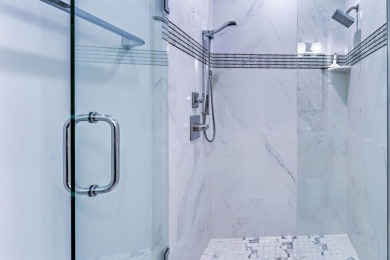 PRICE REDUCED!  Custom Built, BAY FRONT home with private dock