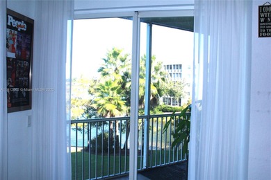 Resort-style corner unit with stunning lake views in the heart