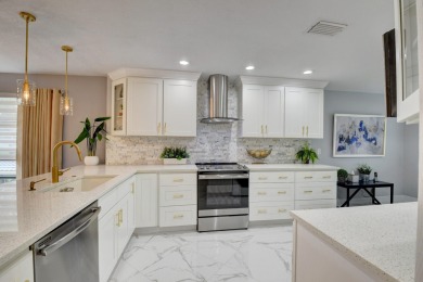 Welcome to Hunters Run Country Club! This spacious 2-bedroom