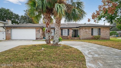 Beautifully updated 4-bedroom, 2.5-bath pool home in the