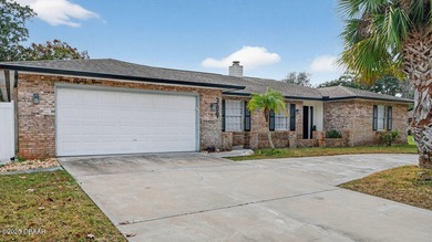 Beautifully updated 4-bedroom, 2.5-bath pool home in the