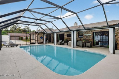 Beautifully updated 4-bedroom, 2.5-bath pool home in the