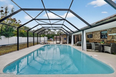 Beautifully updated 4-bedroom, 2.5-bath pool home in the