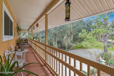 Experience the beauty of Old Florida on 2.4 acres surrounded by